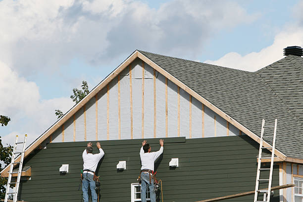 Professional Siding Replacement technician working in Maidens, VA